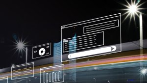 Nighttime cityscape with light trails from passing traffic and illuminated street lamps. Overlaid are white line drawings of digital UI elements: a chat window with a search input field, a dashboard with a pie chart, a text window, and a bar chart.