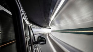 A car driving through a tunnel.