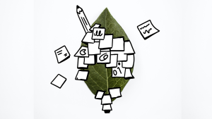 Pflanzenblatt mit schwarzweißen Illustrationen von Papier und Stift darauf