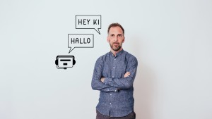 Philip Wicke mit Sprechblasen KI